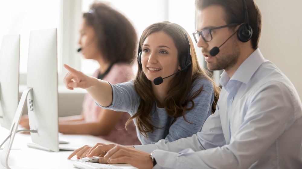IT service desk engineers resolving support calls